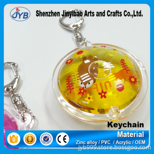 custom fashion floating acrylic keyring round shape liquid inside keychain